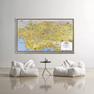 a large wall-mounted map of Los Angeles, with two white bean bag chairs positioned in front of it.