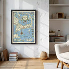 a framed map of the United States hanging on a white wall in a living room.