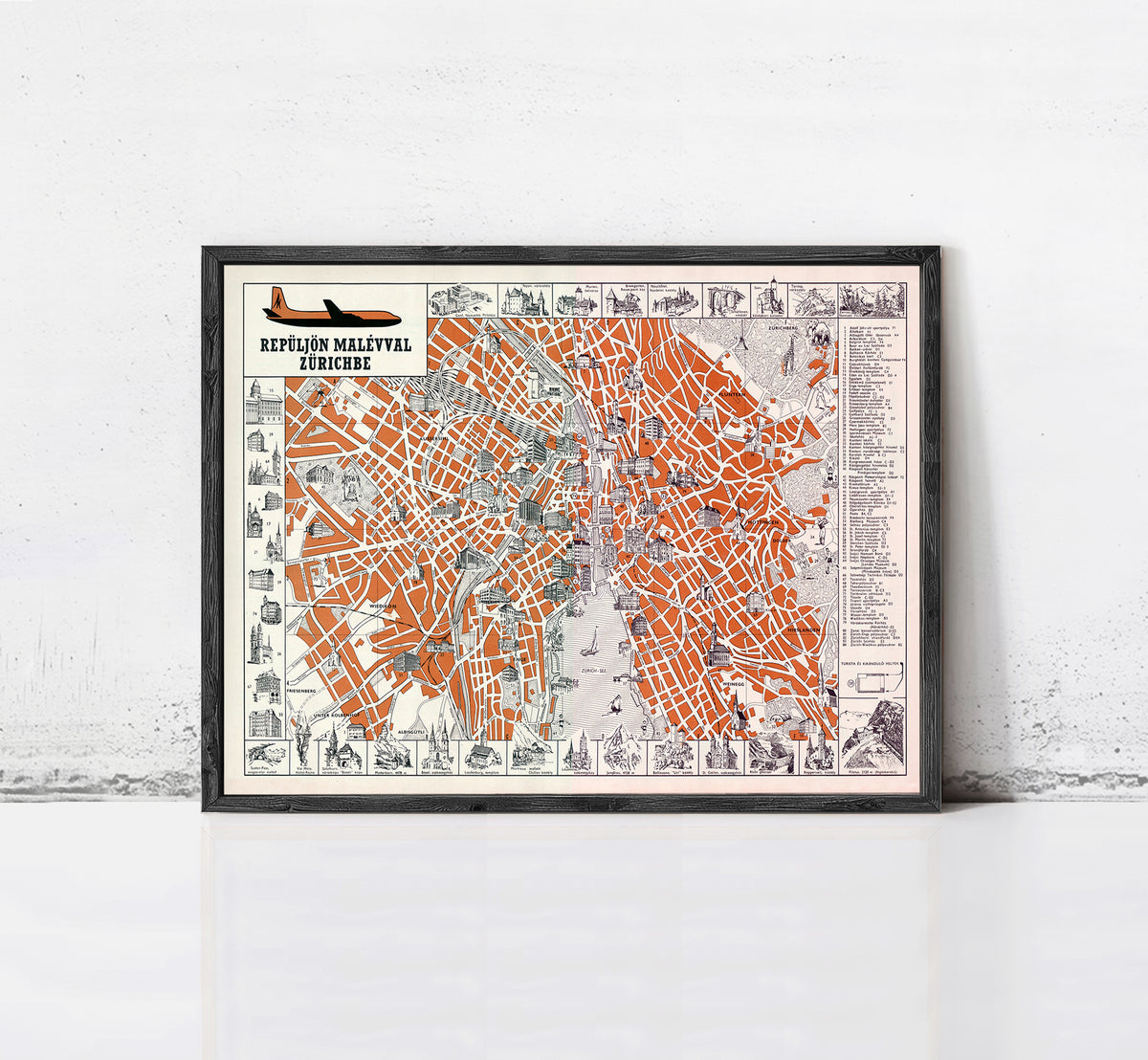 The image is a framed vintage map of Prague, Czech Republic, depicting the city's streets and landmarks in an orange and black color scheme.