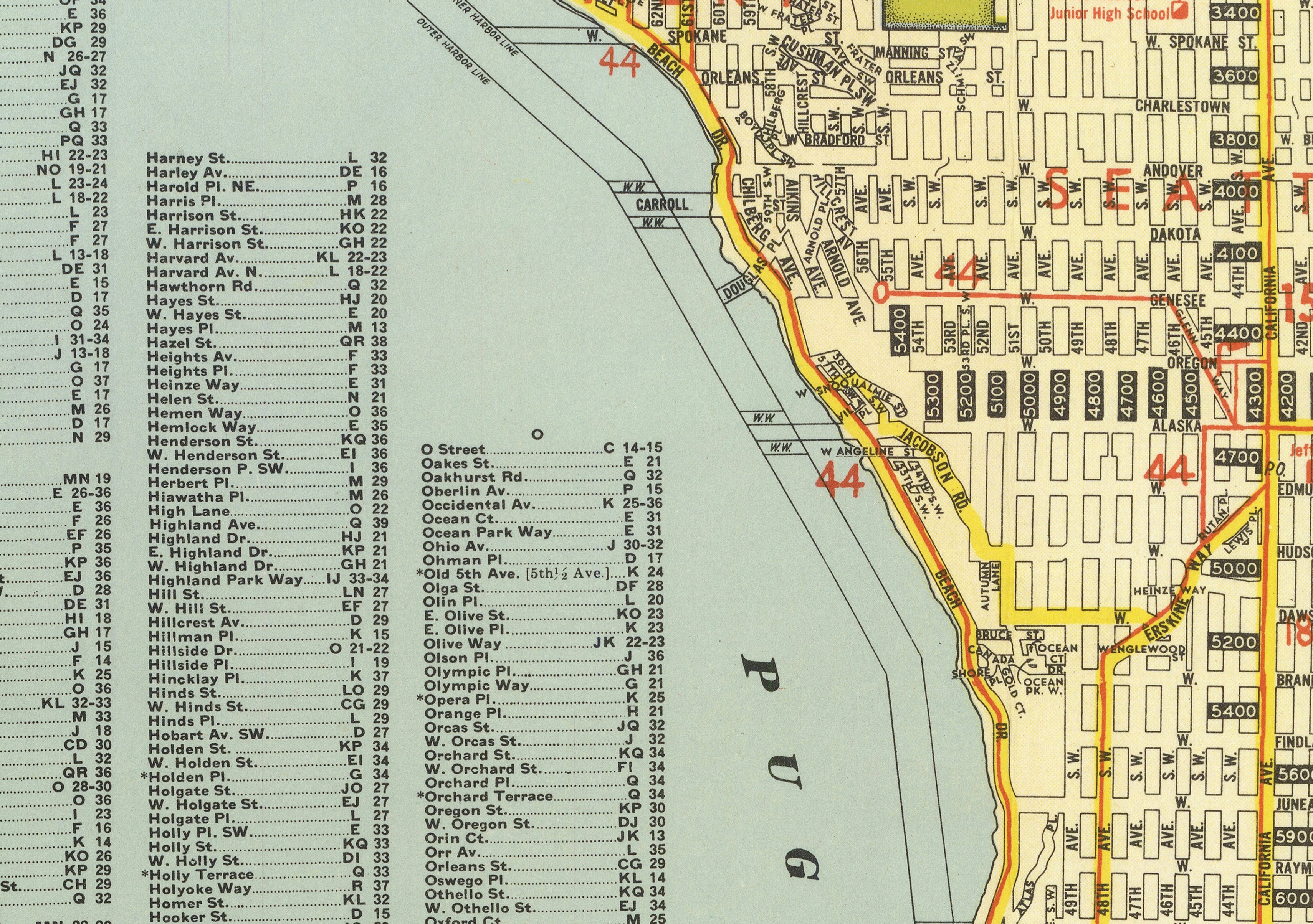 The image is a detailed map of a city, showing streets, landmarks, and various points of interest. The map includes a large body of water and a coastline, providing a comprehensive view of the city's layout. The map is color-coded and includes a legend for better understanding the different symbols and markings. The image is not too cluttered, and the focus is on providing clear and concise information about the city's geography and layout.