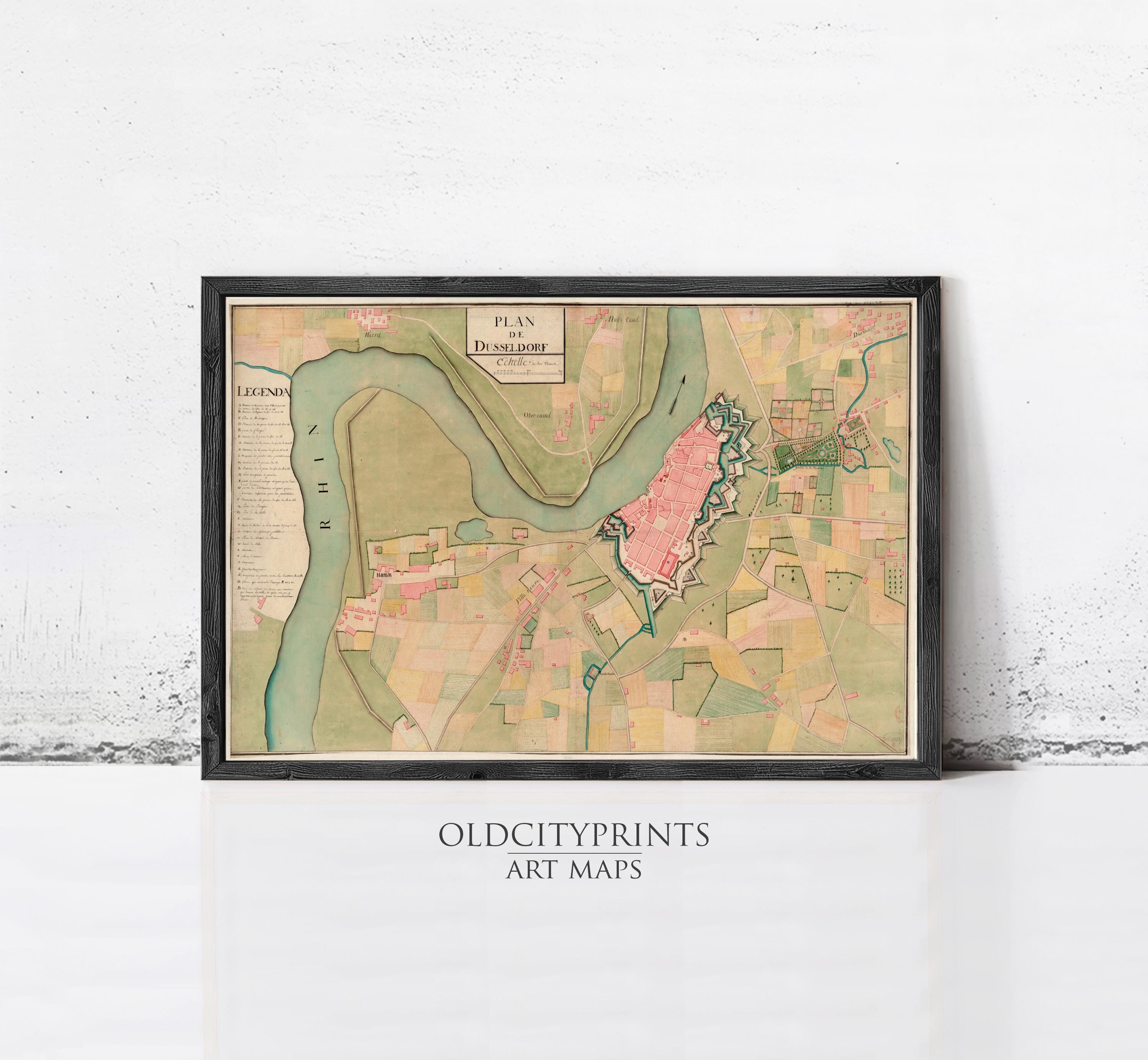 The image is a framed art map of a city, depicting various landmarks and geographical features.