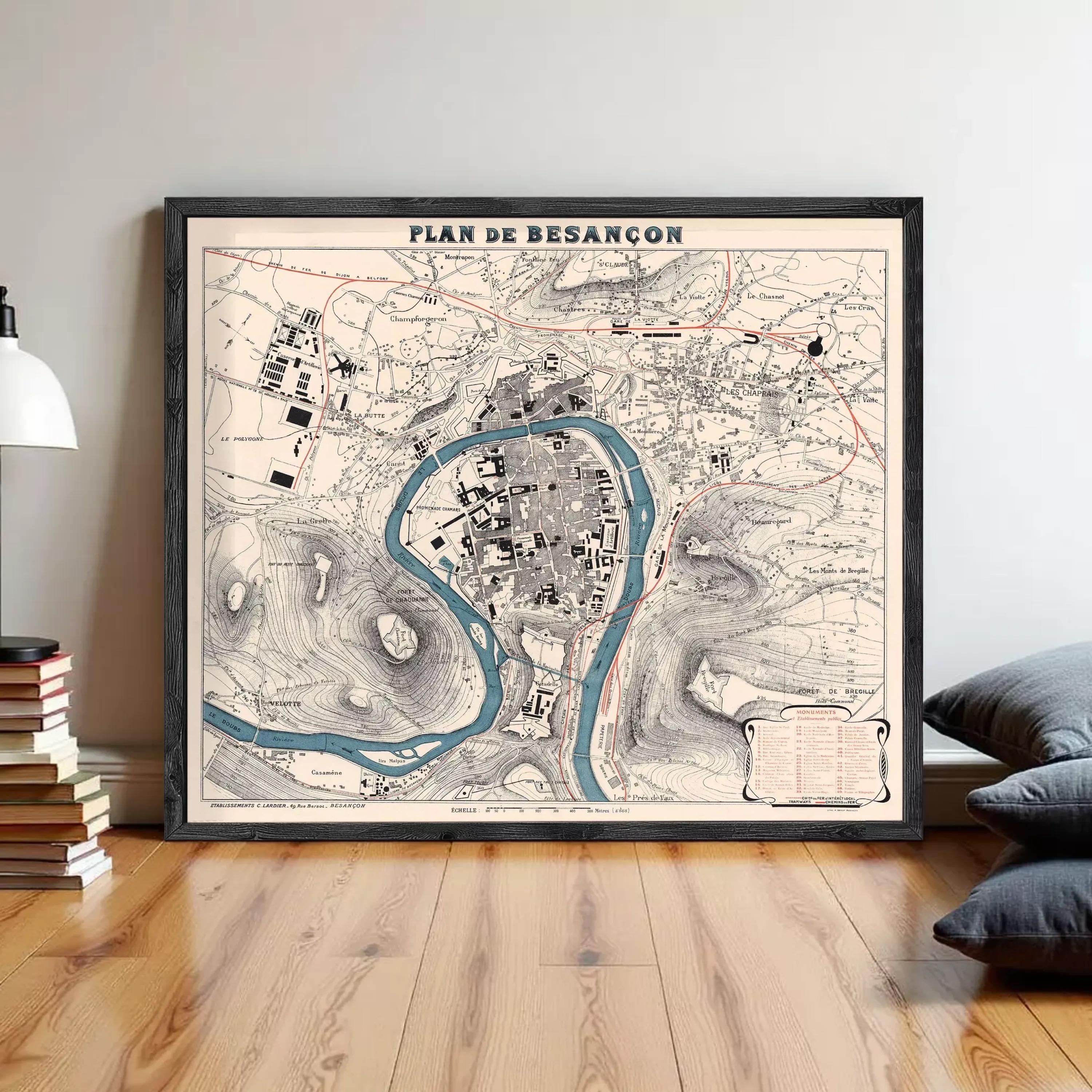 The image is a framed vintage map of the city of Besancón, depicting the city's layout and surrounding areas.