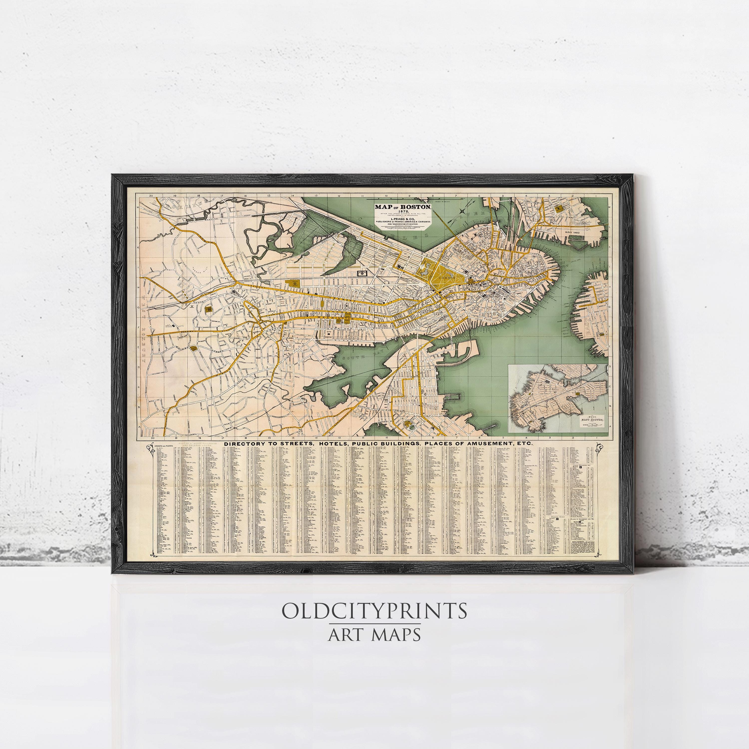The image is a framed vintage map of Boston, Massachusetts, with a grid of street names and locations.