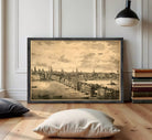 The image is a framed print depicting a cityscape with a river and boats, possibly from the 19th century.