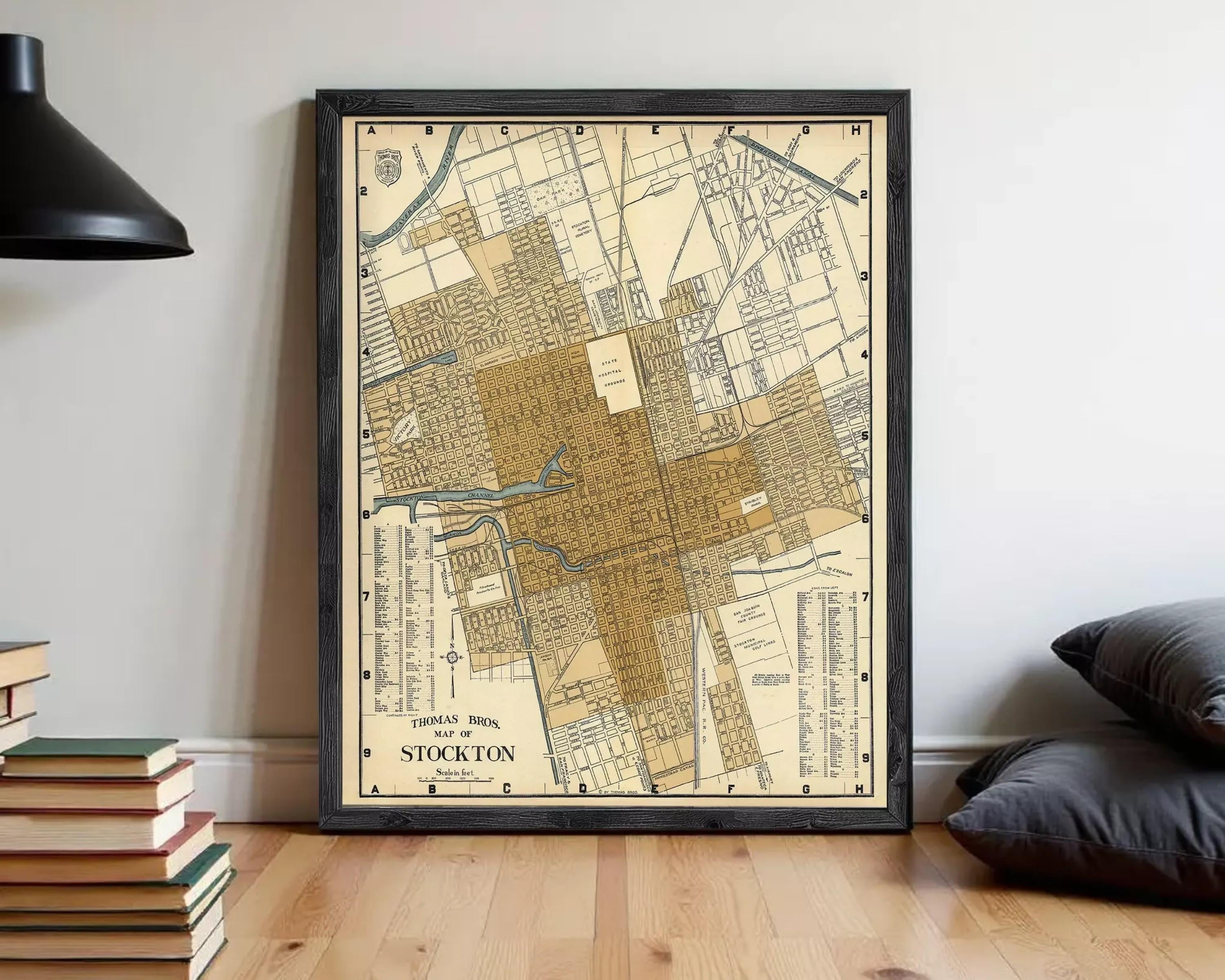 The image is a framed vintage map of Stockton, California, depicting the city's layout and surrounding areas.