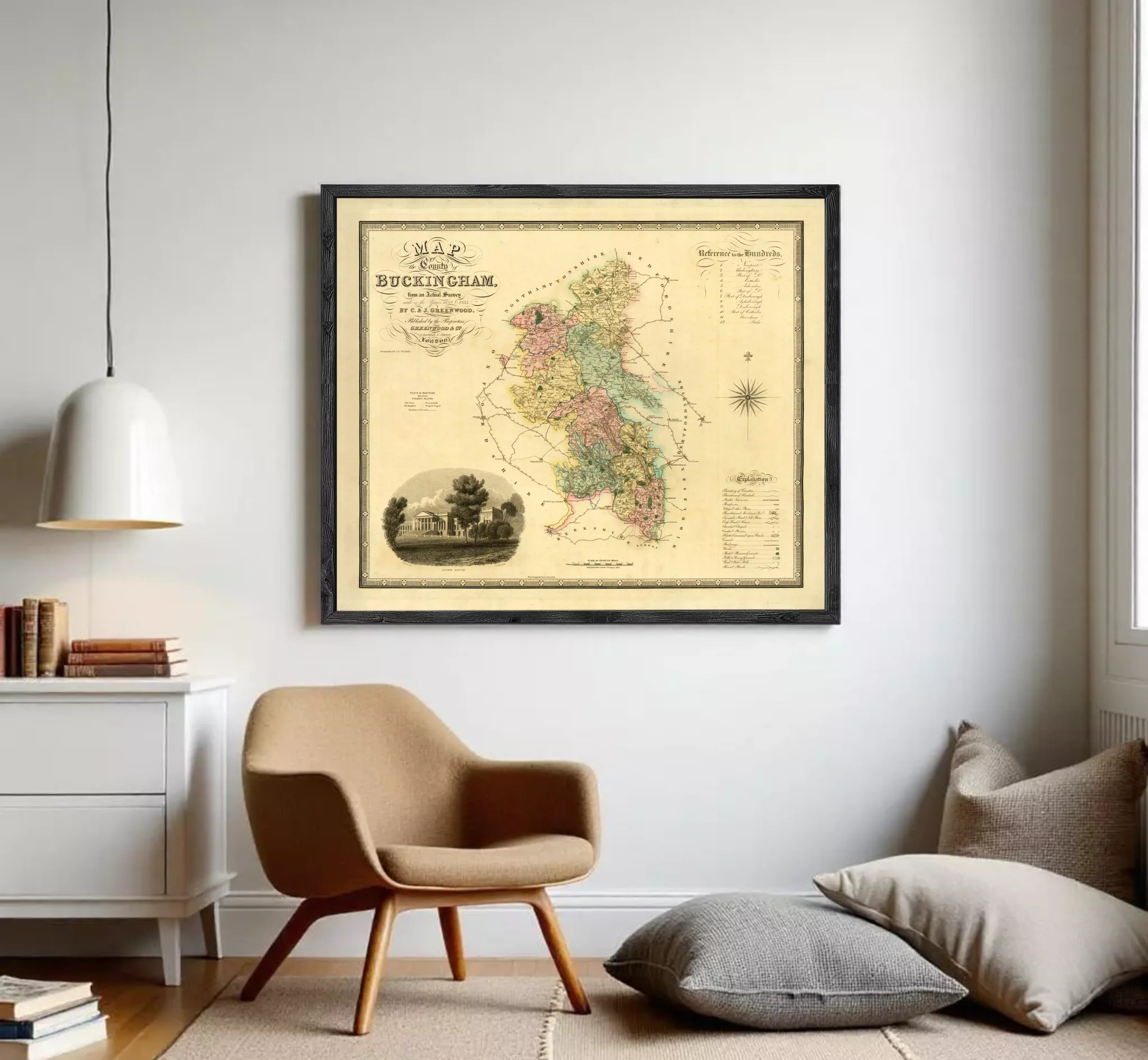 The image is a framed antique map of the city of Buckingham, England, depicting a detailed and colorful representation of the area.