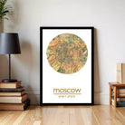 A framed map of Moscow, Russia, with the city's name and coordinates displayed.
