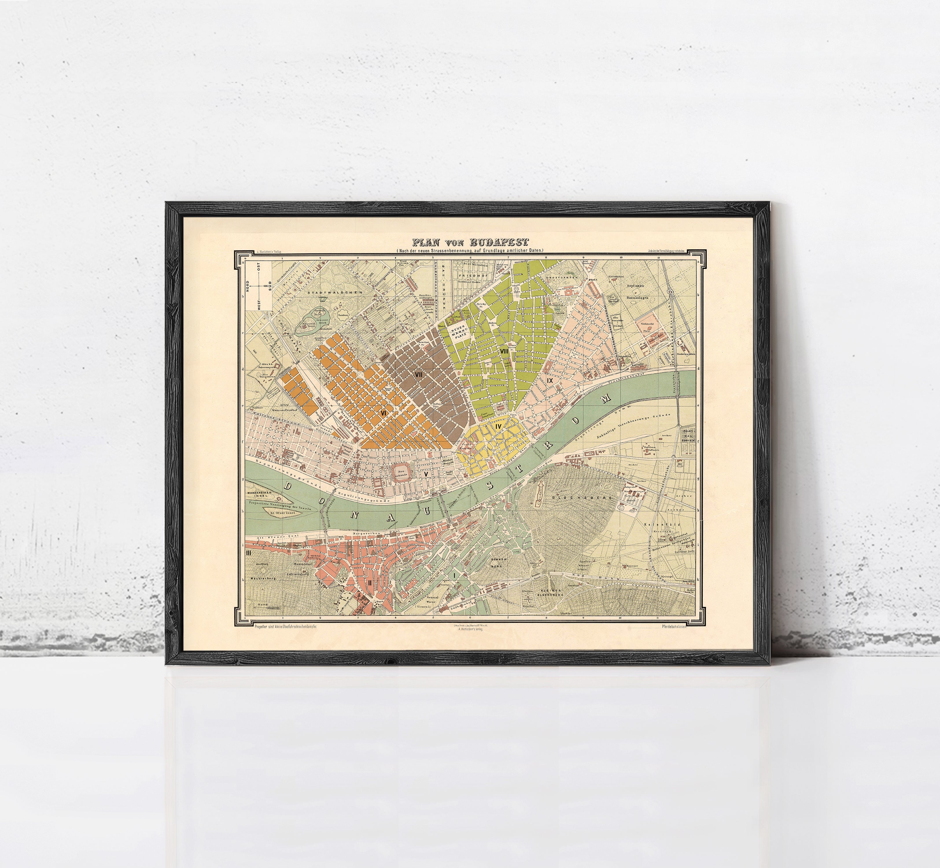 The image is a framed vintage map of Berlin, Germany, depicting the city's streets and landmarks.