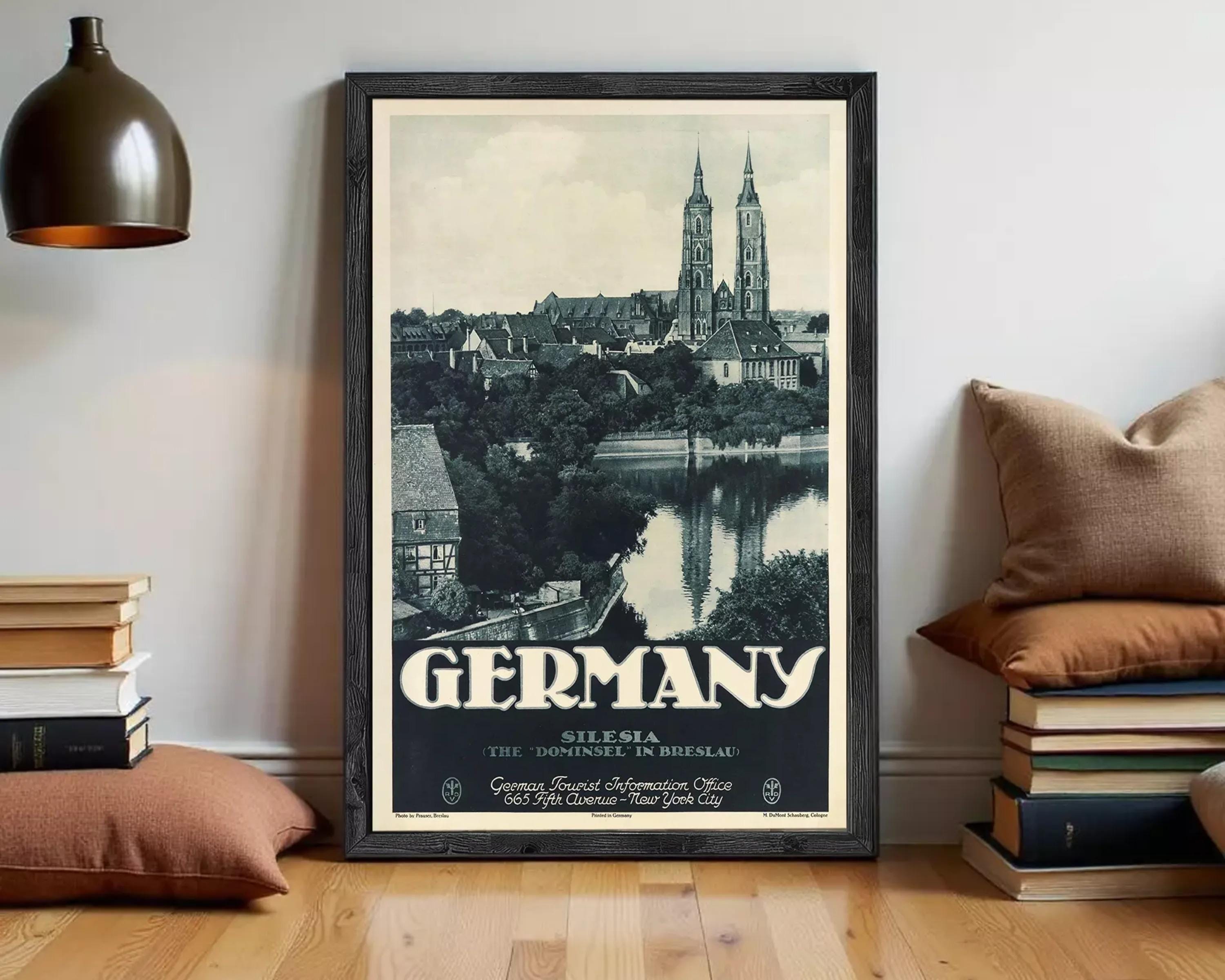 A framed vintage travel poster depicting the city of Silesia, Germany, with the city's iconic landmarks such as St. Peter's Basilica and the Neckar River in the background.