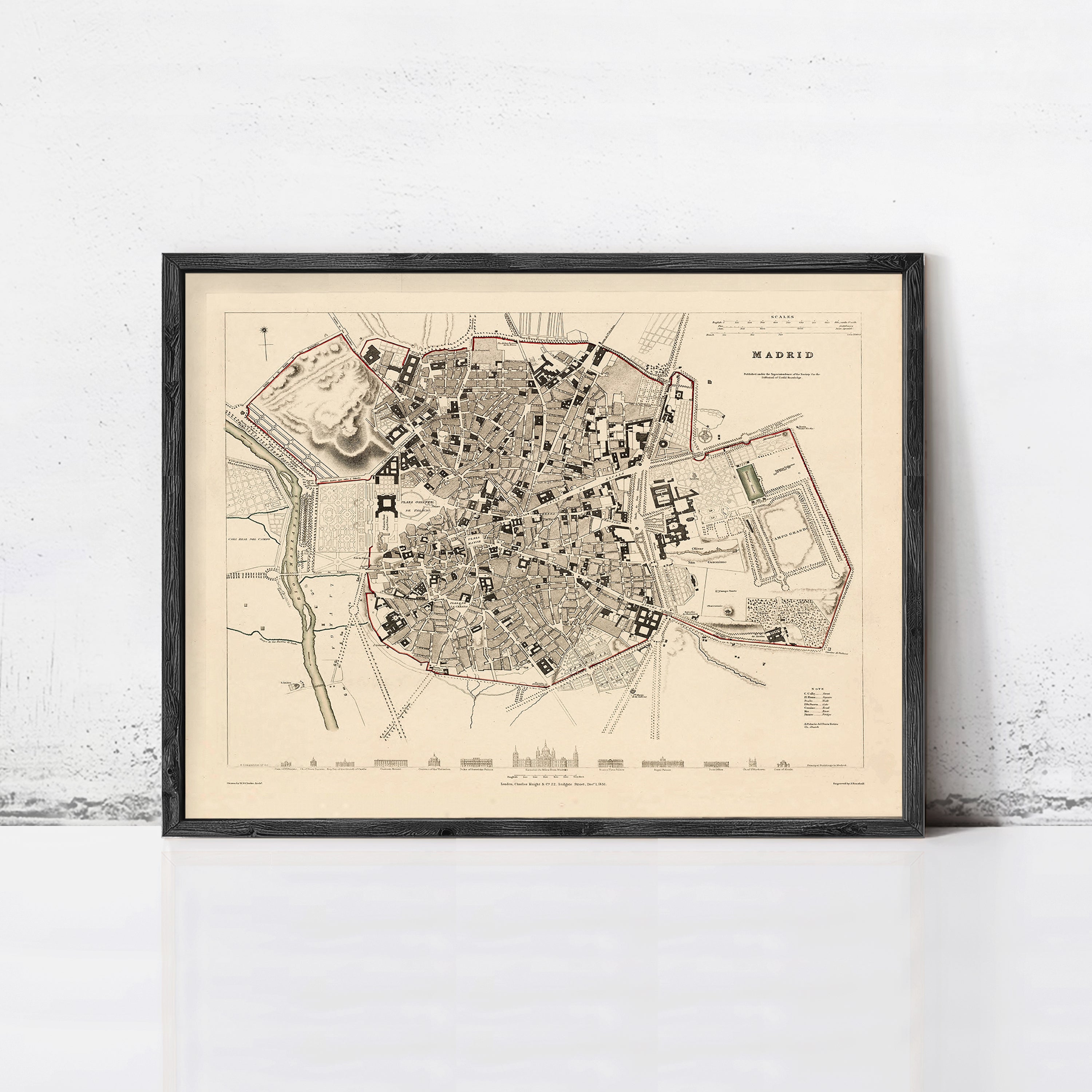 The image is a framed vintage map of Madrid, Spain, depicting the city's layout and surrounding areas.