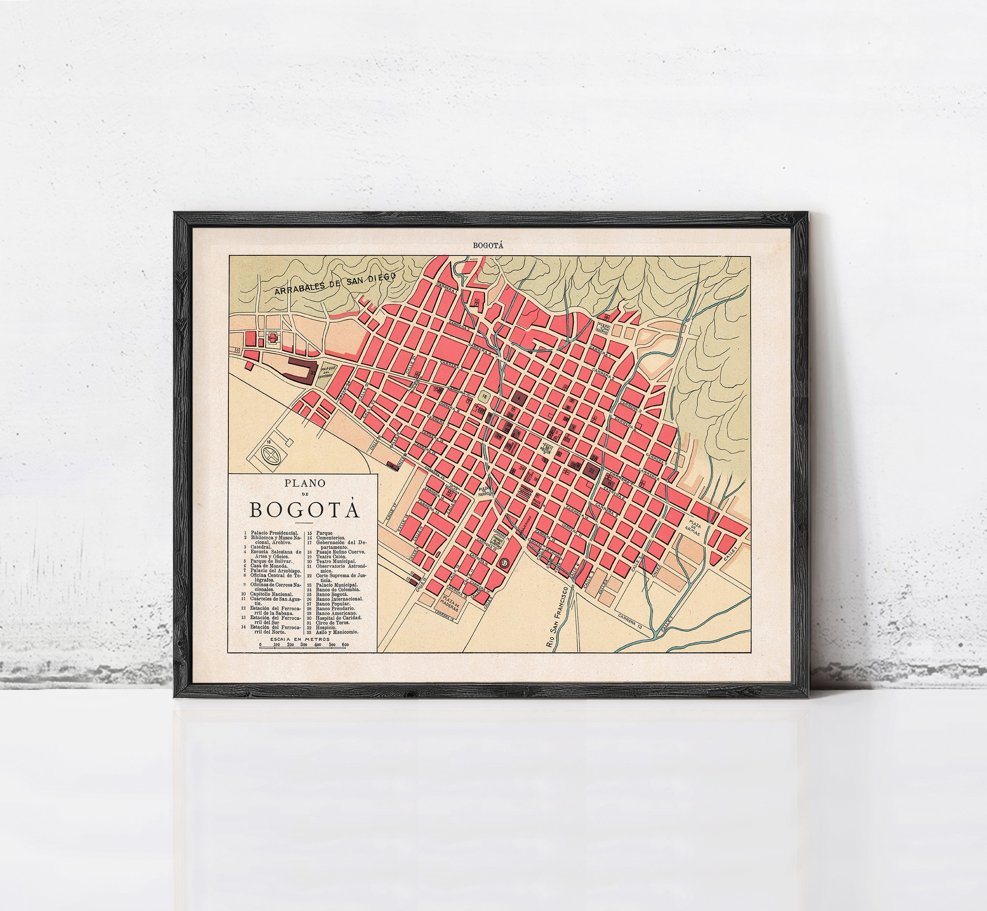 The image is a framed map of Bogota, Colombia, showing the city's layout and streets.
