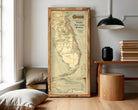 The image is a framed vintage map of Florida, showing the state's land, coastline, and surrounding areas.