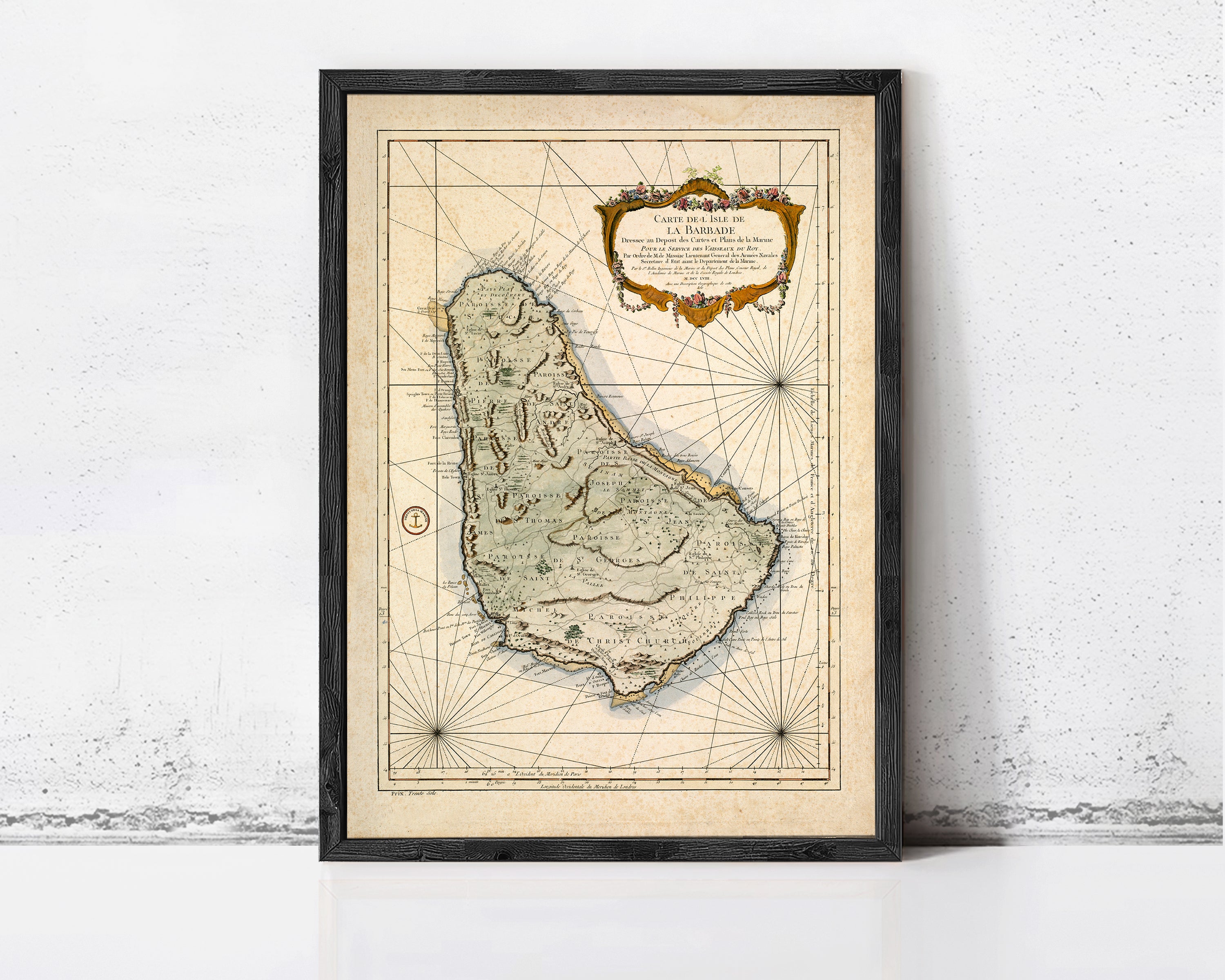 The image is a framed vintage map of the Caribbean island of Barbados, showing the island's geographical layout and surrounding areas.