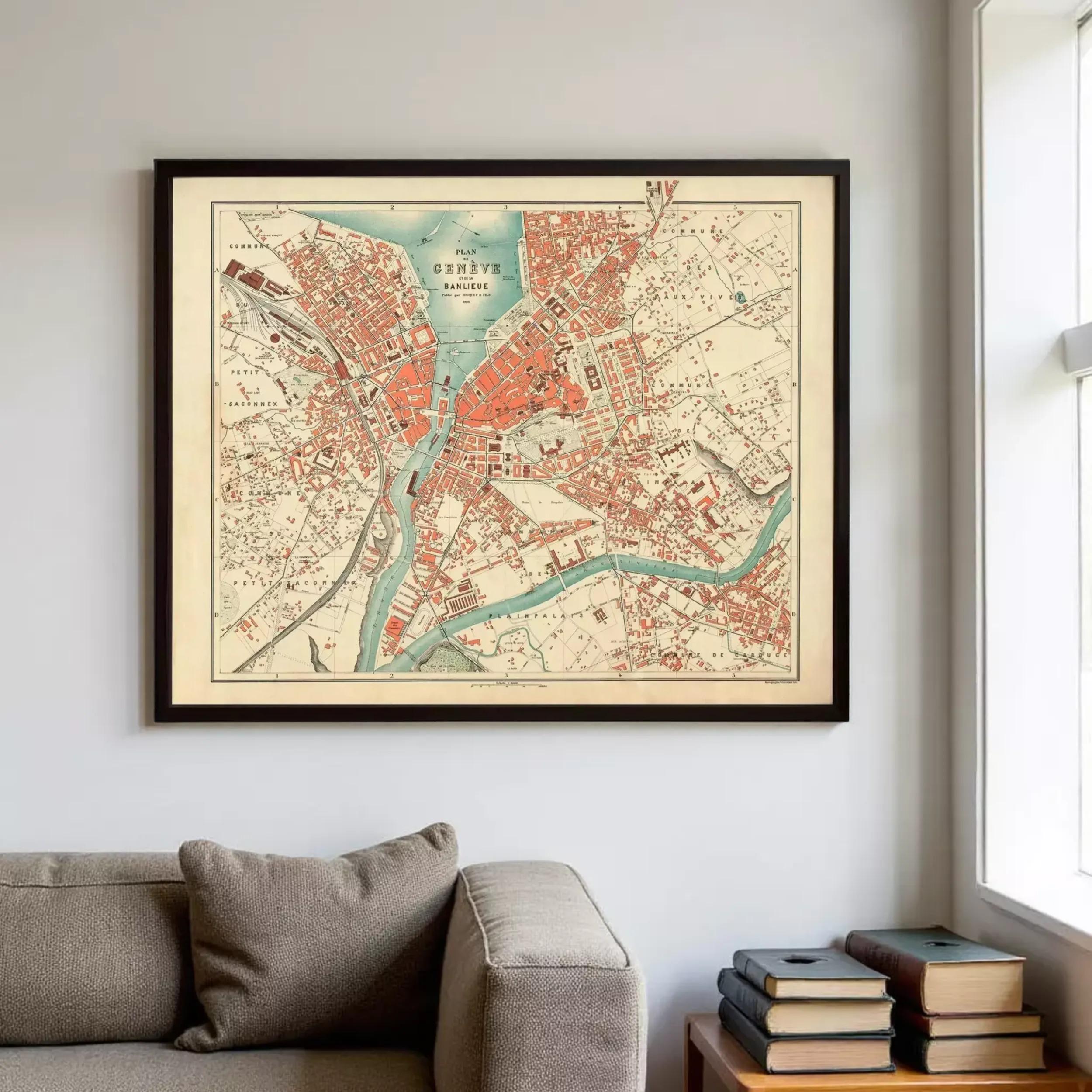a large framed map of the city of Geneva, Switzerland, hanging on a wall above a couch in a living room.