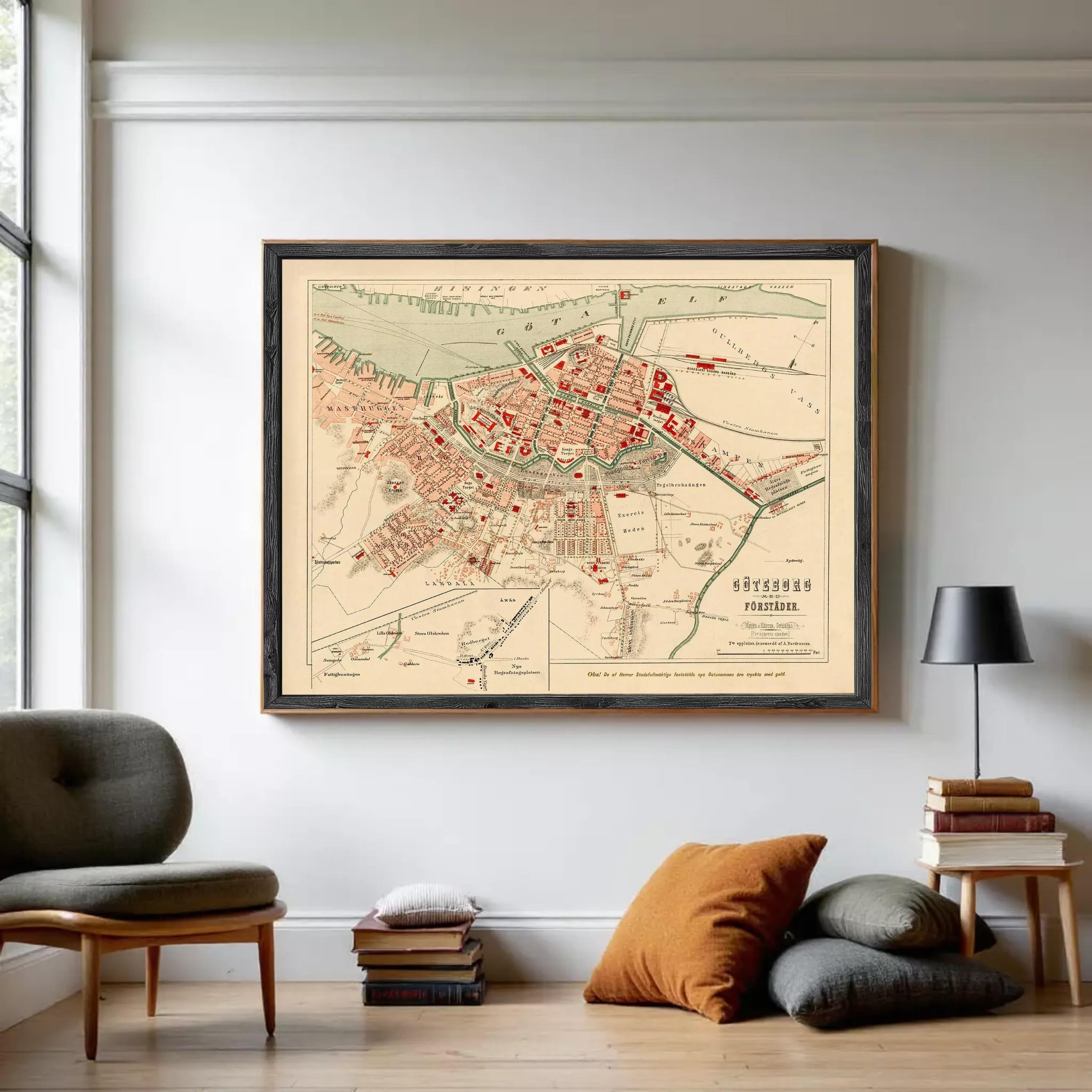 The image is a framed vintage map of a city, likely from the 19th century, depicting the city's layout and surrounding areas.
