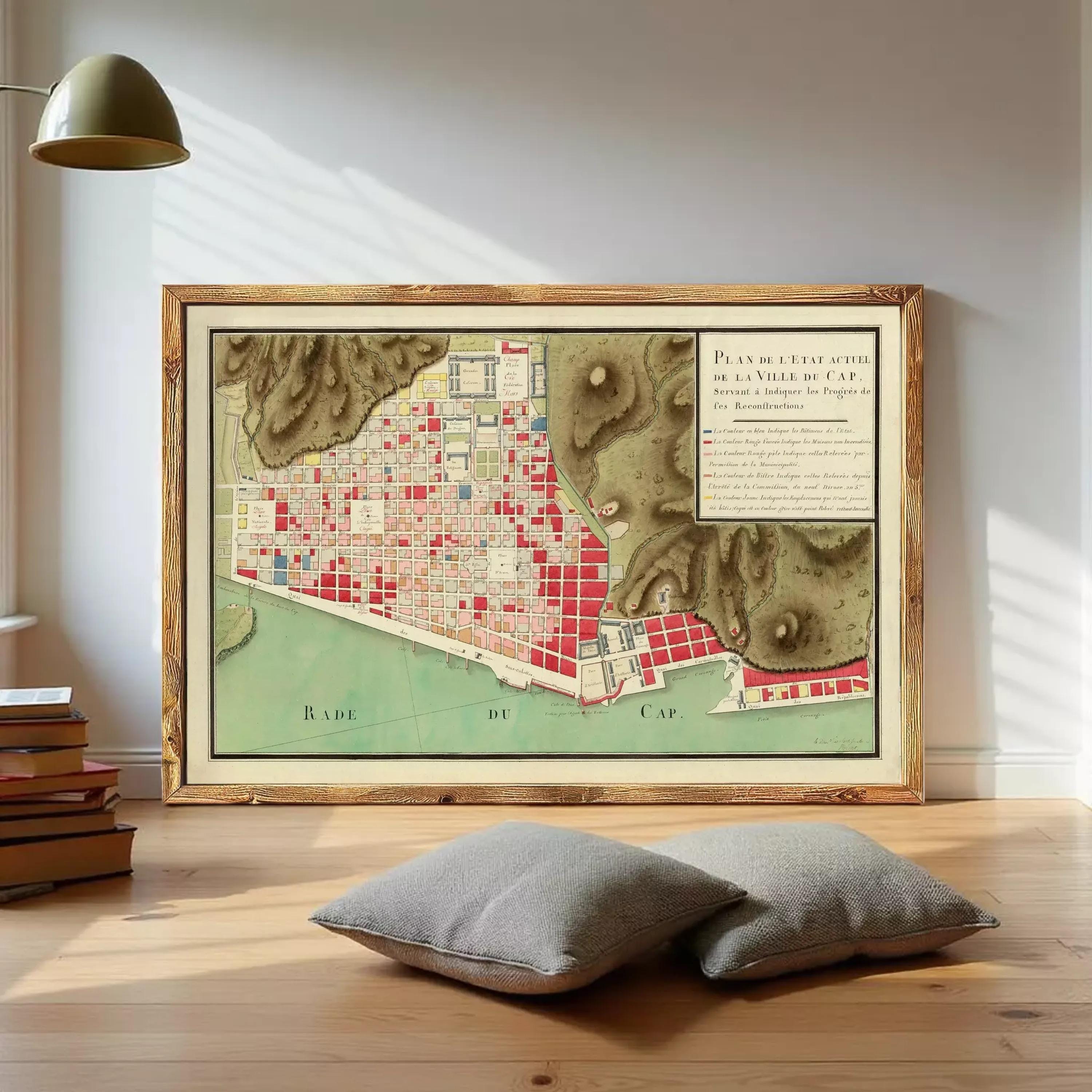 The image is a framed map of a city, depicting a detailed layout of the streets, buildings, and other urban features.