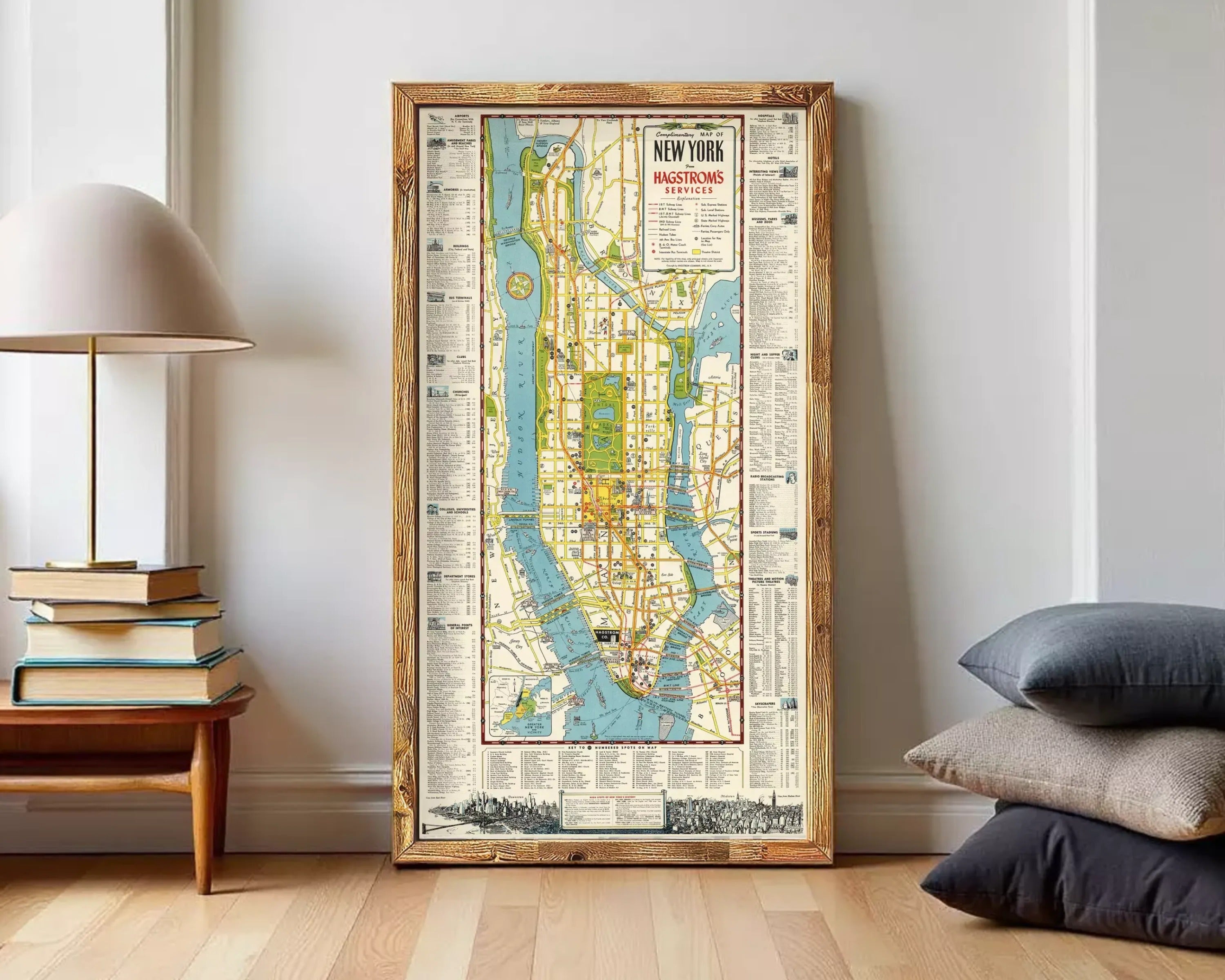 The image is a framed vintage map of New York City, featuring a detailed layout of the city's streets, landmarks, and waterways.