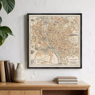 The image is a framed vintage map of Budapest, Hungary, depicting the city's streets and landmarks.