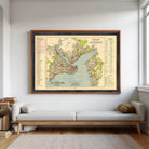 The image is a framed vintage map of a city, likely New York, with various streets, landmarks, and bodies of water labeled.