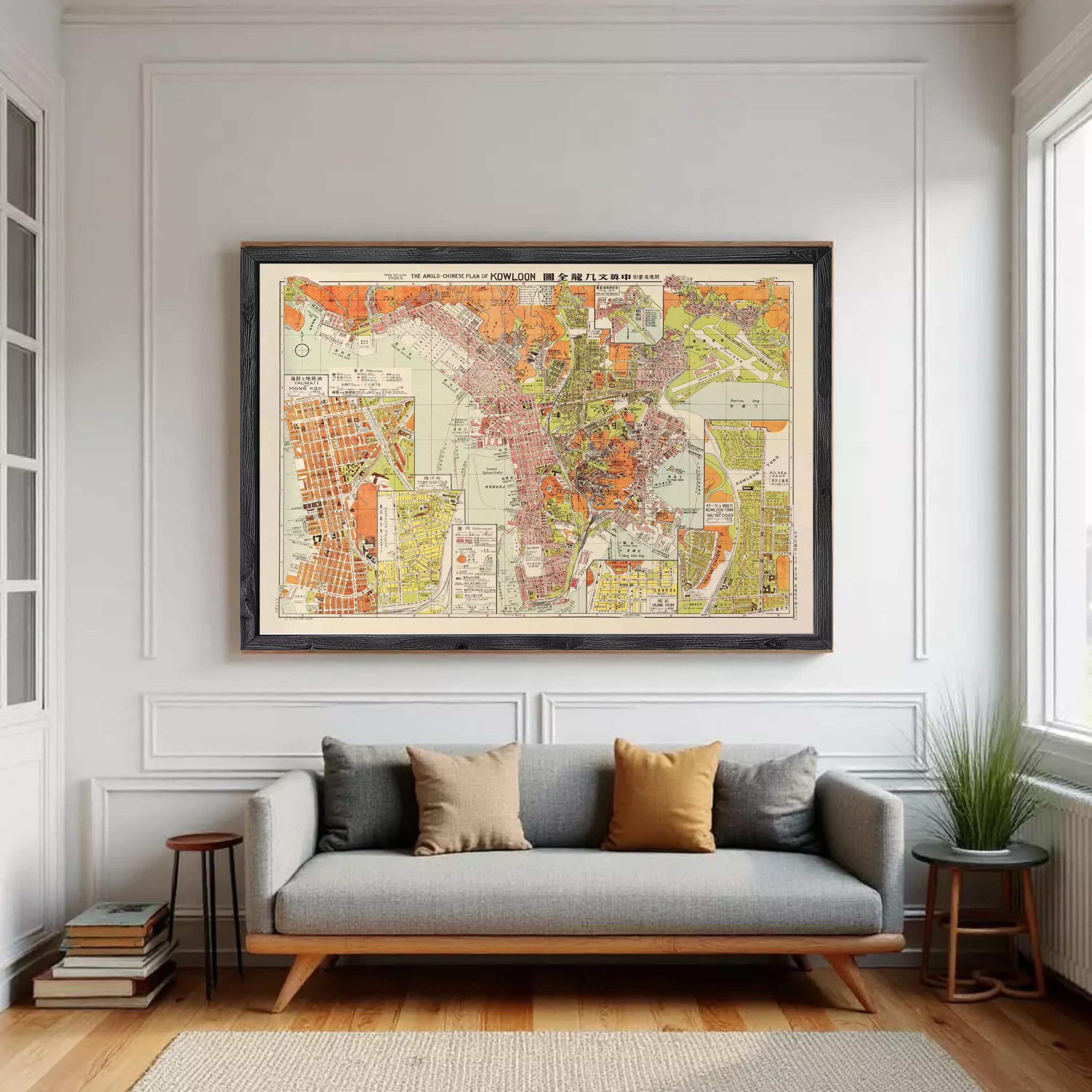 The image is a framed vintage map of a city, depicting various streets, landmarks, and geographical features.