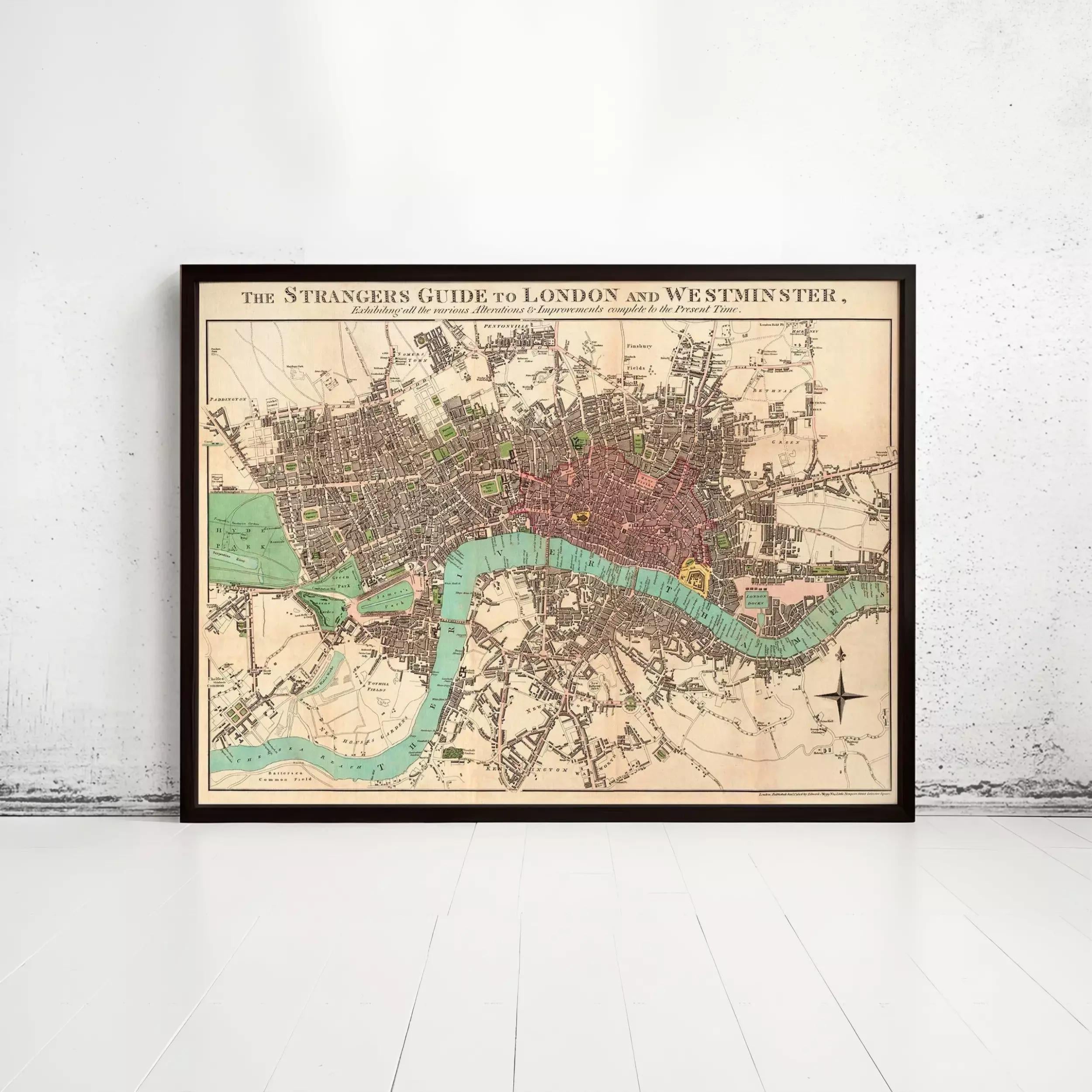 The image is a framed map of London and Westminster, England, depicting the city's streets, landmarks, and surrounding areas.