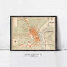 The image is a framed vintage map of a city, likely from the 19th century, with a focus on the layout and streets.