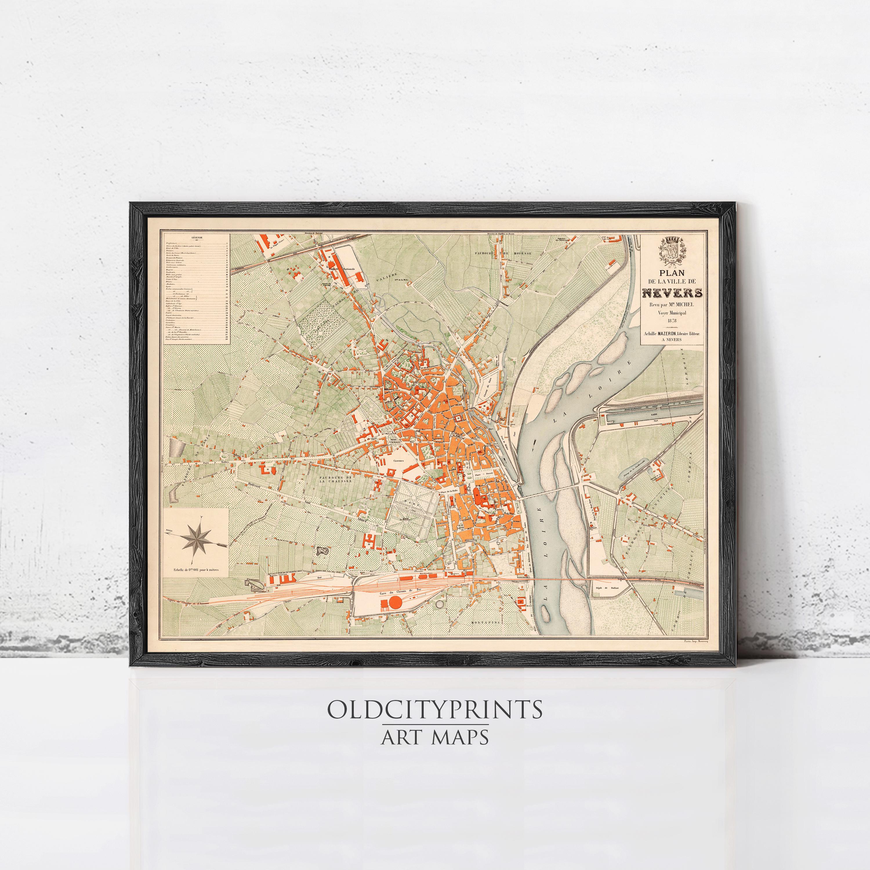 The image is a framed vintage map of a city, likely from the 19th century, with a focus on the layout and streets.