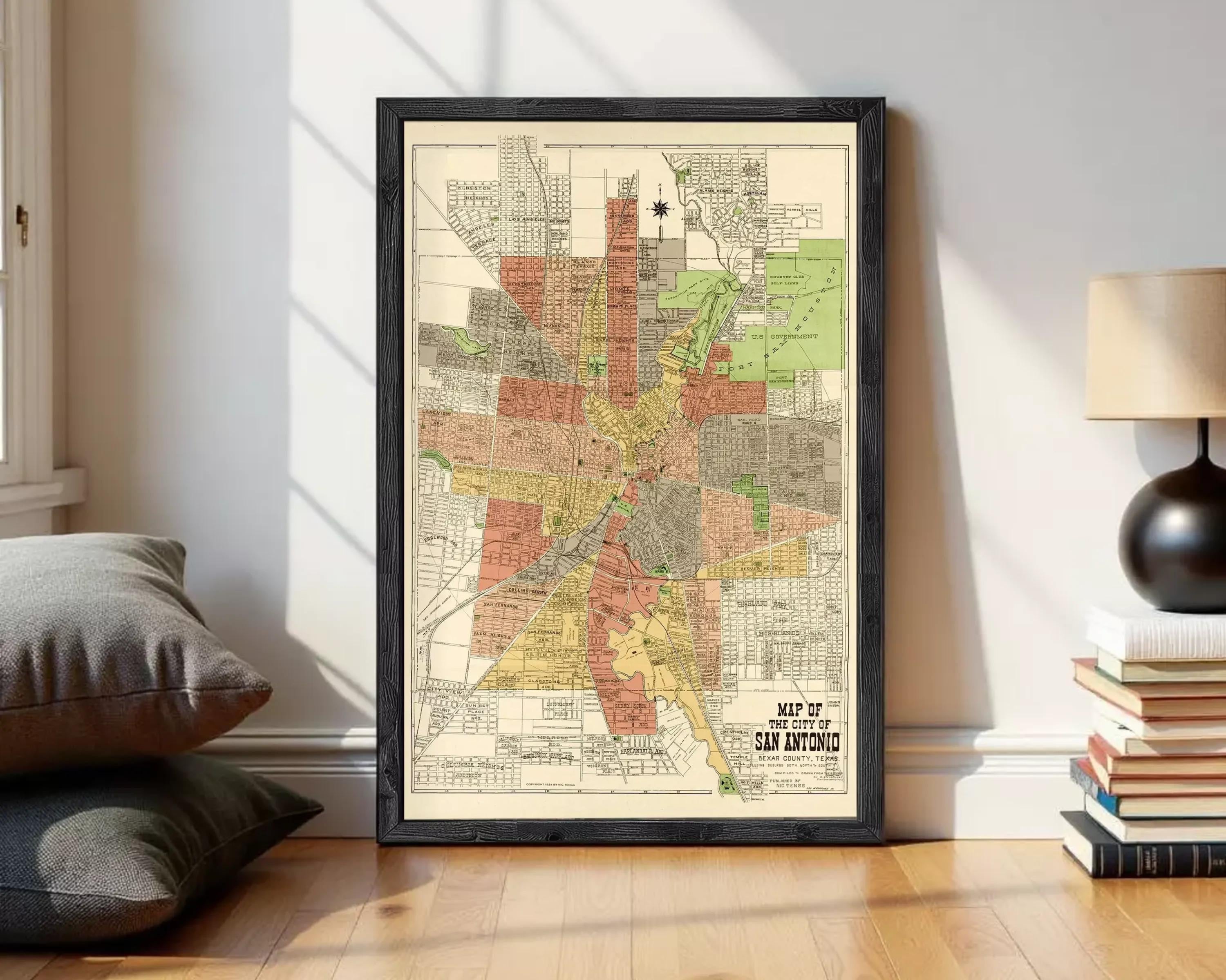The image is a framed map of San Antonio, Texas, depicting the city's layout and surrounding areas.