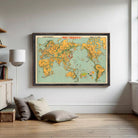 The image is a framed vintage map of the world, depicting various countries and regions in a colorful and detailed manner.