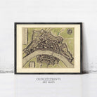 The image is a framed antique map of a city, likely from the 16th century, depicting a detailed layout of the city with streets, buildings, and other landmarks.