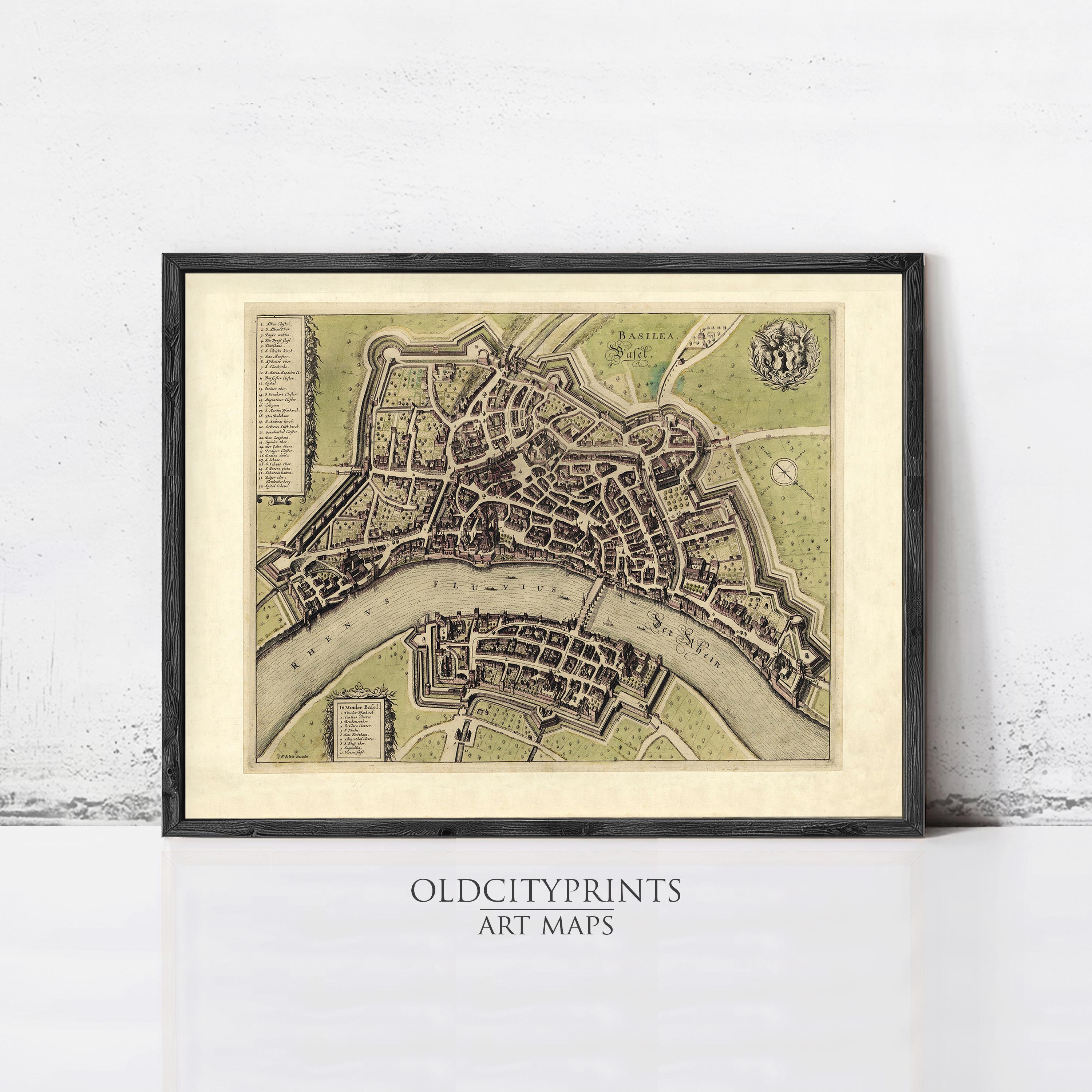 The image is a framed antique map of a city, likely from the 16th century, depicting a detailed layout of the city with streets, buildings, and other landmarks.