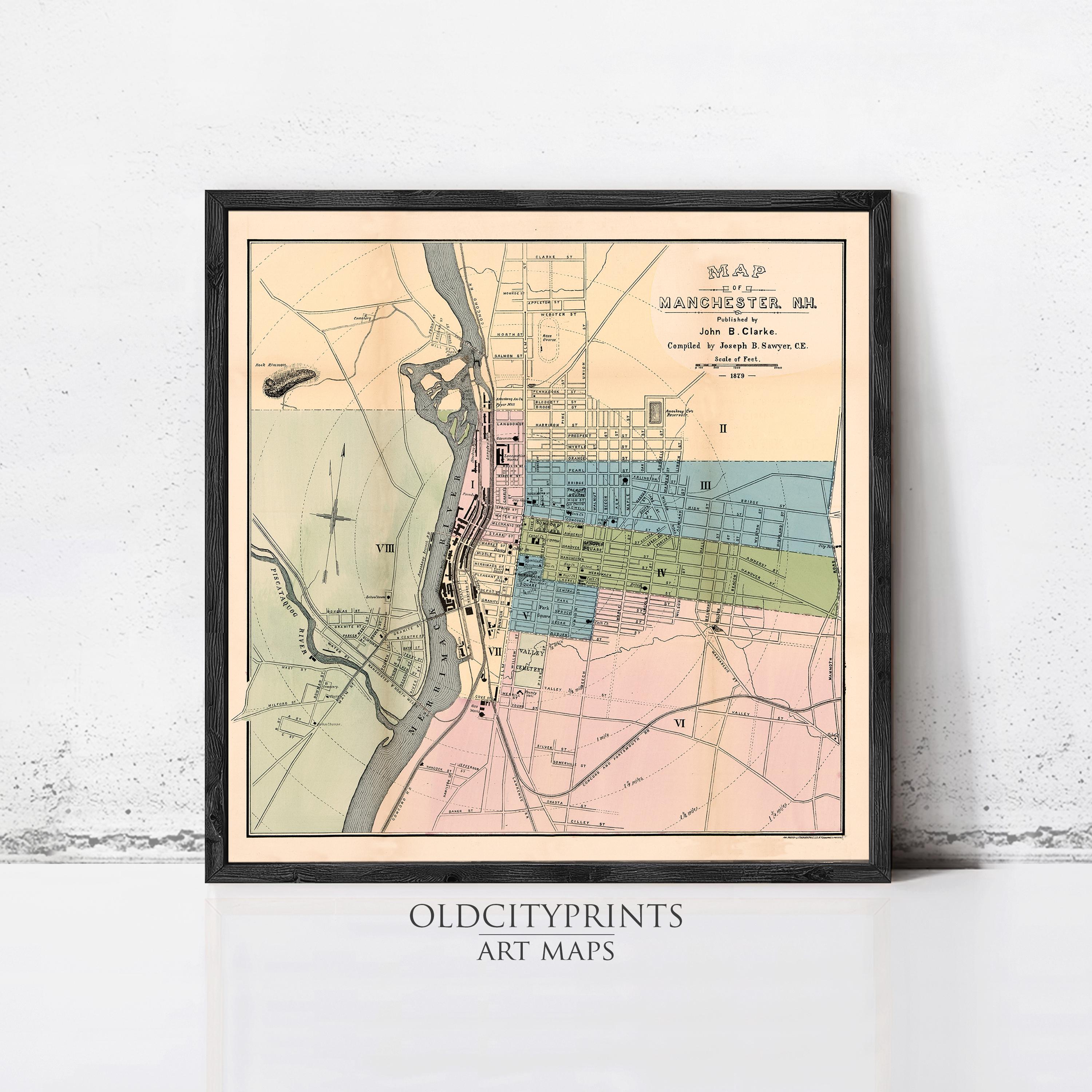 The image is a framed vintage map of Manchester, New Hampshire, showing the layout of the city and surrounding areas.