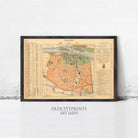 The image is a framed vintage map of a city, likely from the early 20th century, with detailed street maps and labels.