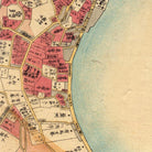 The image is a detailed map of a city, showing various buildings, roads, and other urban features. The map is in Japanese and appears to be a historical or vintage representation of the city.