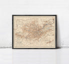 The image is a framed vintage map of Stuttgart, Germany, depicting the city's layout and surrounding areas.