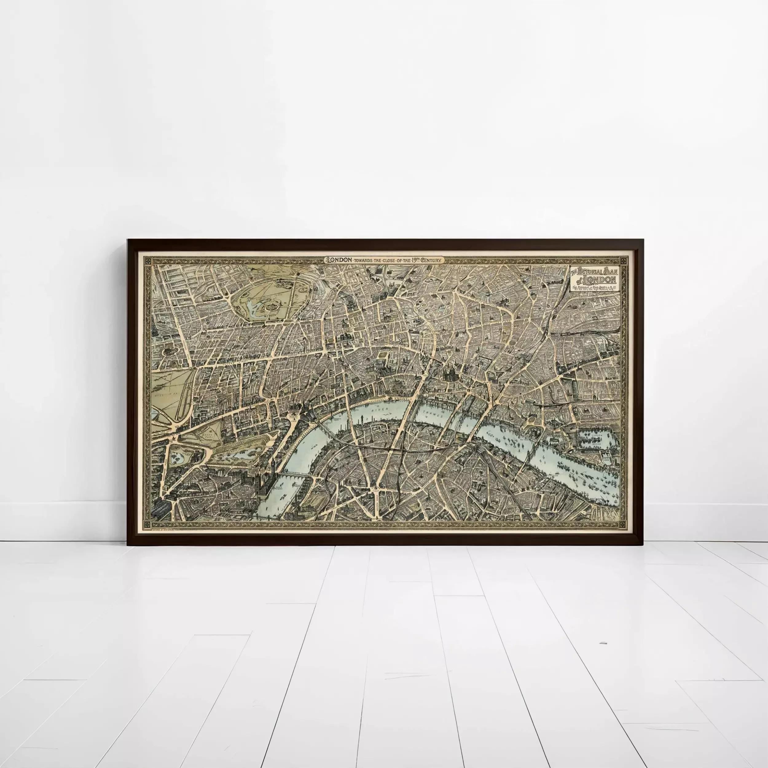 The image is a framed map of London, England, depicting the city's streets and landmarks.