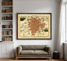 The image is a framed vintage map of a city, likely Paris, with a detailed and colorful depiction of the city's streets and landmarks.