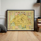 The image is a framed vintage map of Switzerland, depicting the country's geographical layout and surrounding areas.