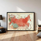 The image is a framed map of the world, depicting the continents and major landmasses in a stylized manner.