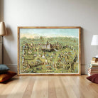 The image is a framed painting depicting a detailed map of a city, with various buildings, roads, and landmarks.
