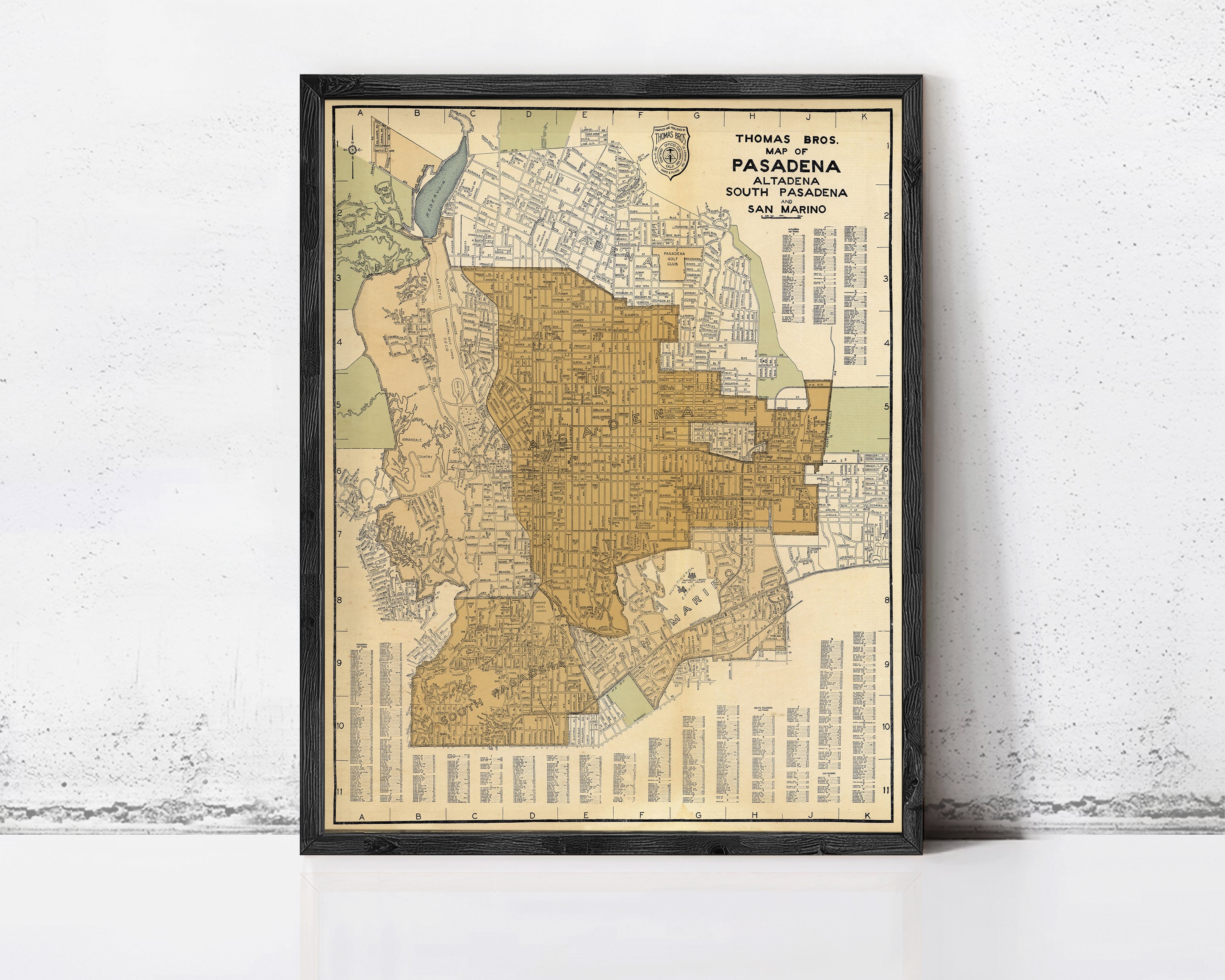 The image is a framed vintage map of the city of Pasadena, California, with a black border and a beige background.