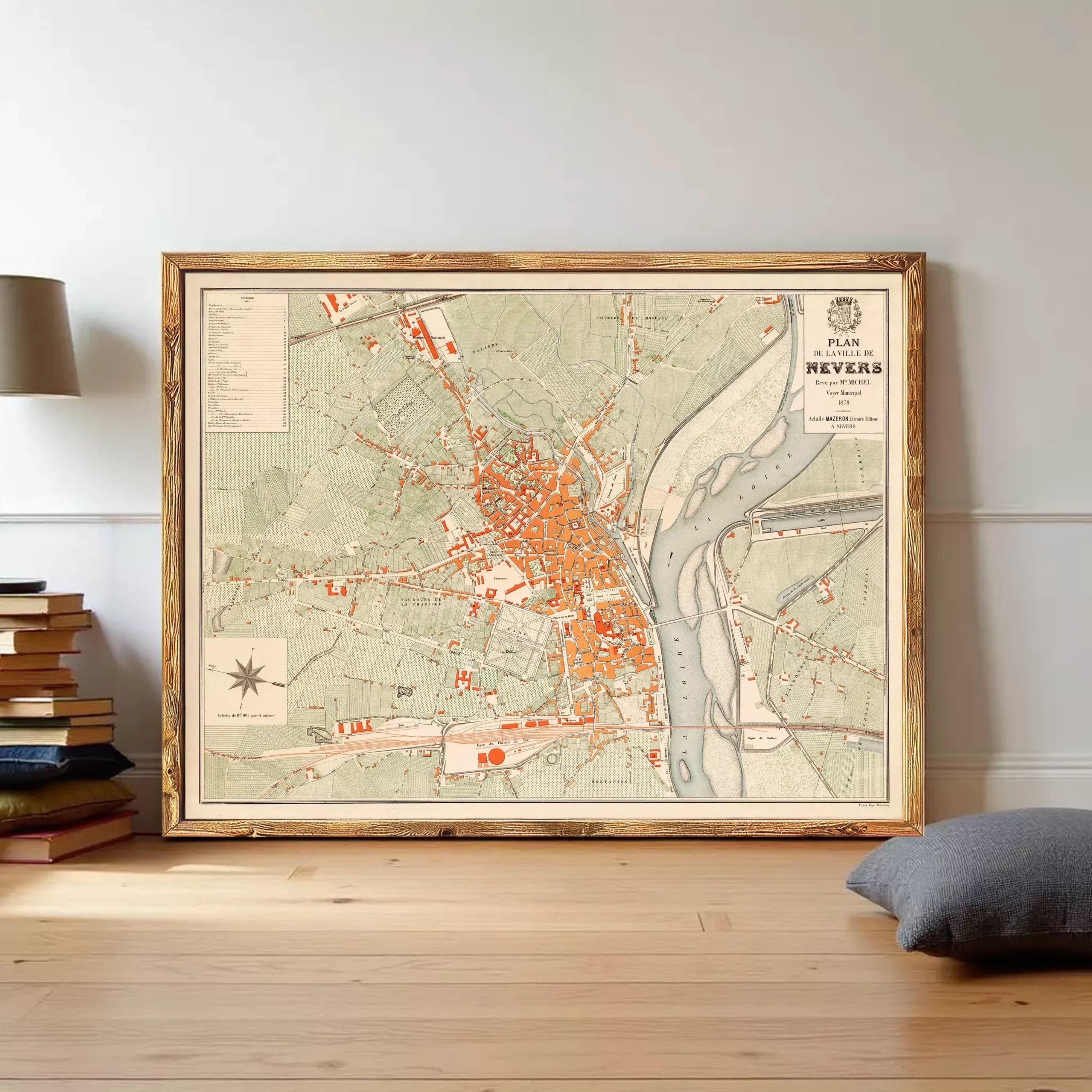 The image is a framed vintage map of the town of Nevers, France, depicting the layout of the streets and surrounding areas.