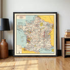 The image is a framed map of France, depicting various regions and landmarks within the country.
