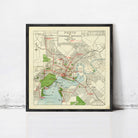 The image is a framed vintage map of the city of Perth, Australia, depicting the city's streets, parks, and other landmarks.