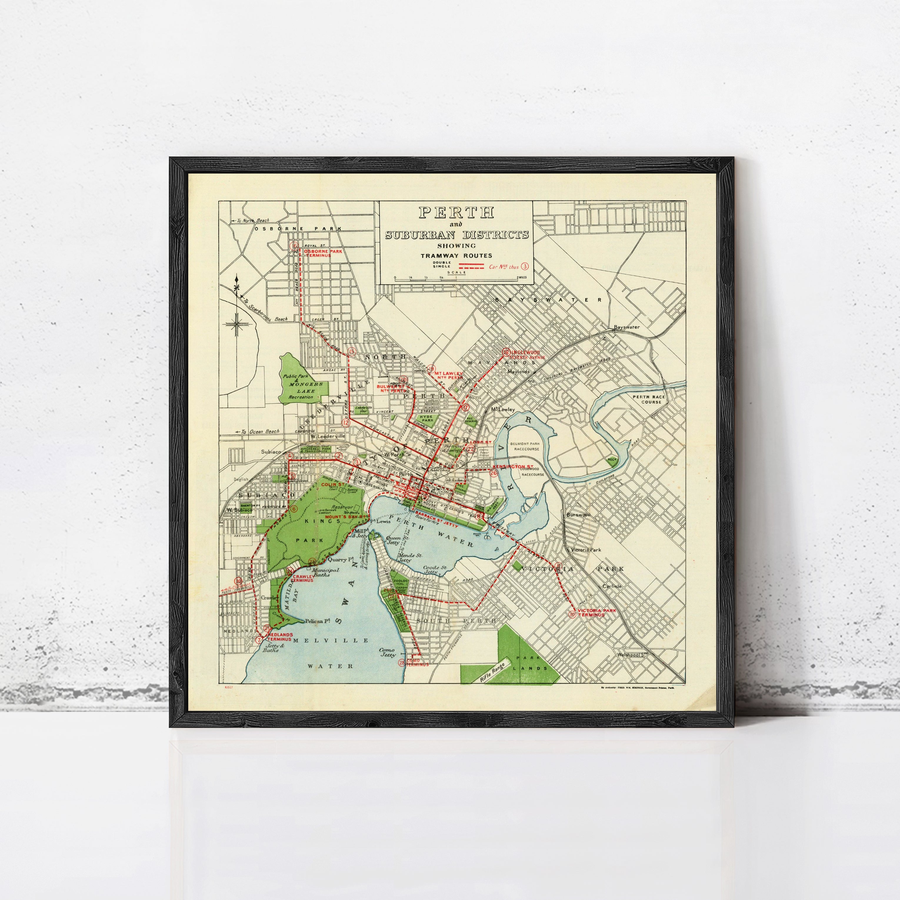 The image is a framed vintage map of the city of Perth, Australia, depicting the city's streets, parks, and other landmarks.