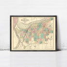 The image is a framed vintage map of the Kansas City area, depicting the city's layout and surrounding regions.