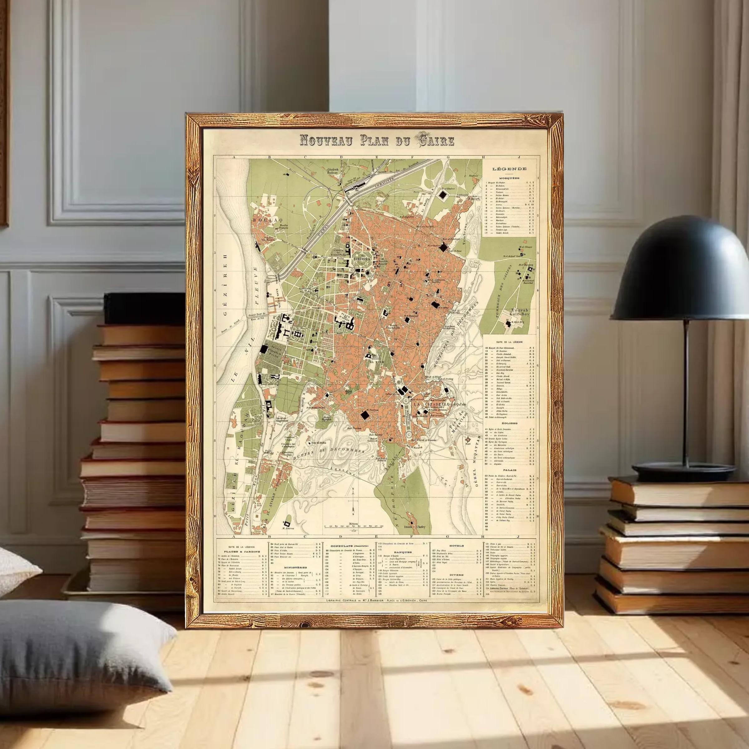 The image is a framed vintage map of a city, likely from the 19th century, with detailed geographical information and labels.