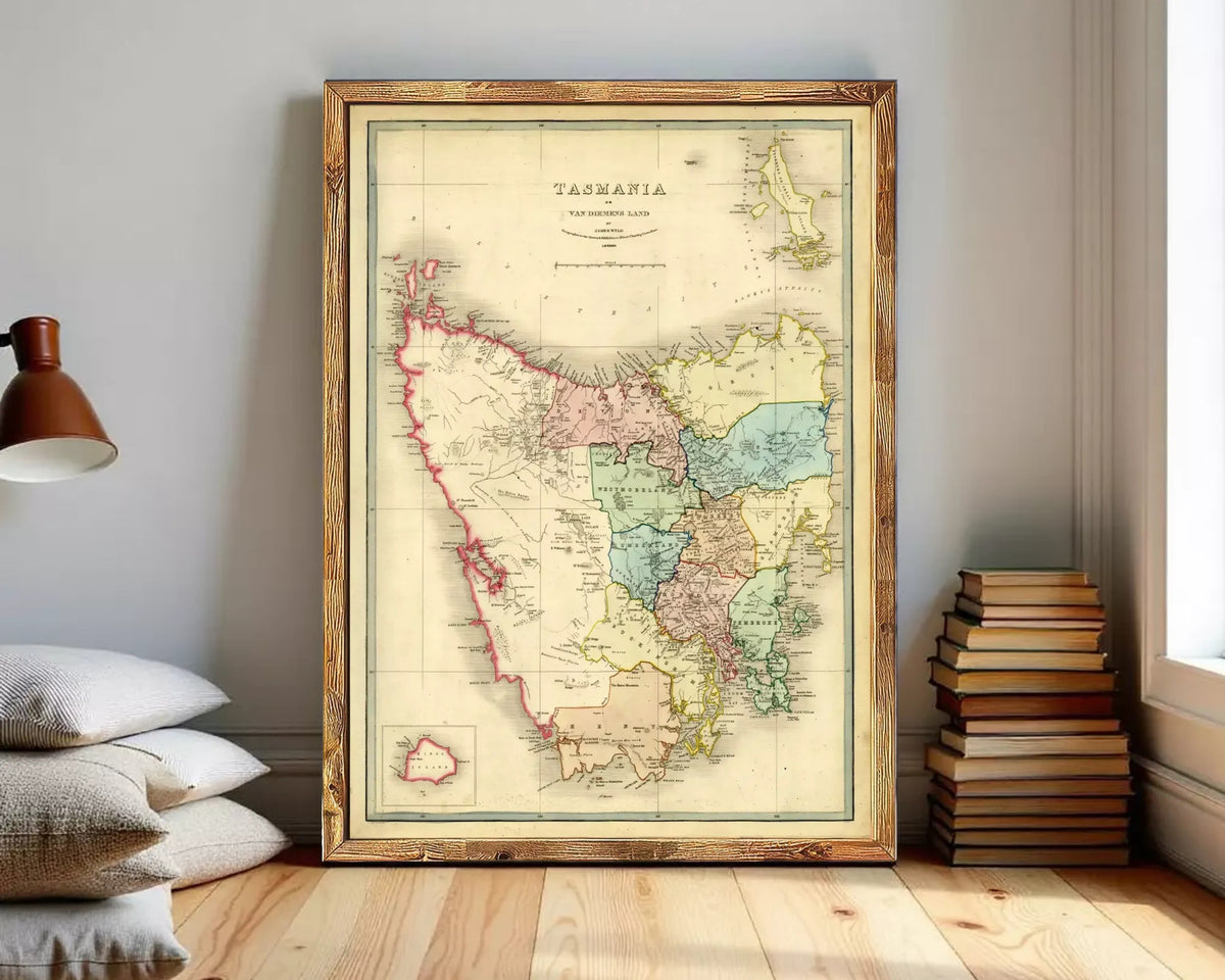 The image is a framed vintage map of Tasmania, Australia, depicting the state's geographical layout and boundaries.