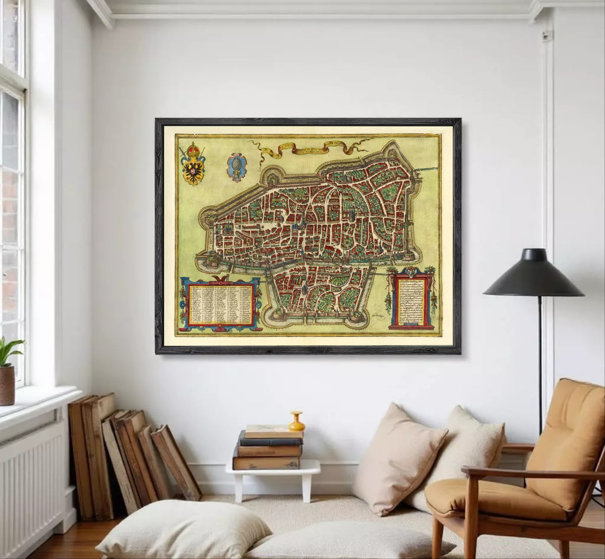 The image is a framed antique map of a city, likely from the Middle Ages, with intricate details and a decorative border.