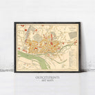 The image is a framed vintage map of a city, likely from the 19th century, with various landmarks and streets depicted in a detailed manner.